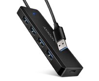 Axagon HUE-C1A cestovní čtyřportový USB-A 5Gbps hub/USB-C konektor pro externí napájení/kabel 19 cm