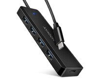 Axagon HUE-C1C cestovní čtyřportový USB-C 5Gbps hub/USB-C konektor pro externí napájení/kabel 19 cm