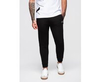 Pánské tepláky s žebrovanými nohavicemi a gumovým potiskem – černé V1 OM-PASK-0223 Černá, S